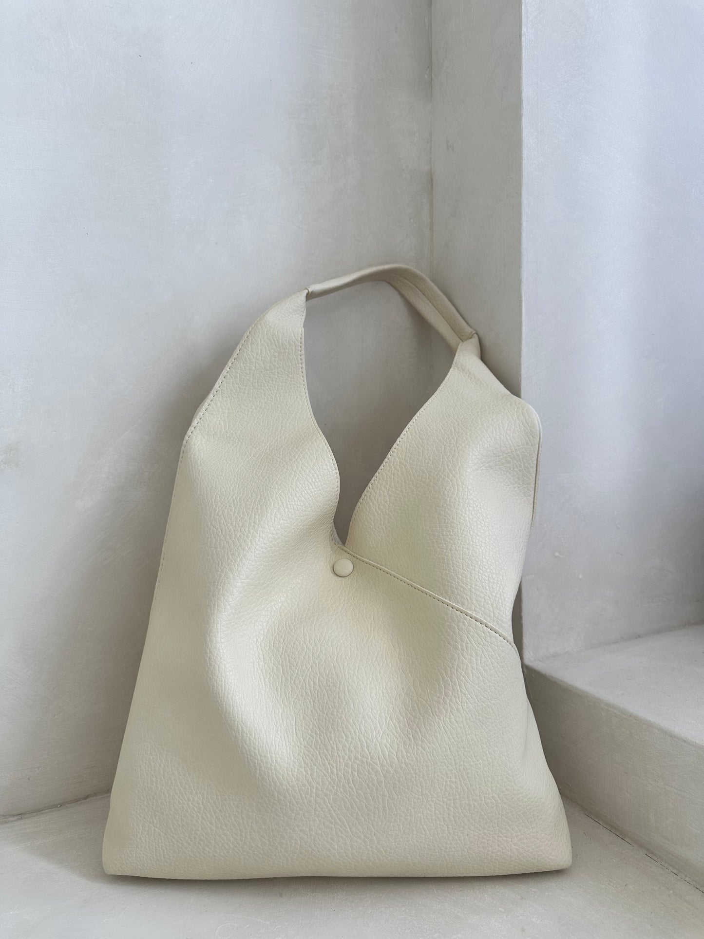 KYOMI Buttercream slouchy handbag